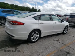 2018 Ford Fusion SE z VIN 3FA6P0HD9JR183760, wystawiony jako Copart lot #59983025 z przebiegiem 95 206 mil mil oraz Szkoda całkowita • Salvage title. Historia ofert i sprzedaży dostępna na DreamBid. Obrazek 3.