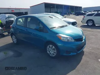 2014 Toyota Yaris L with VIN JTDKTUD3XED590915, listed as a IAAI auction lot 41920726 with 69,783 mi miles. Bid and sale history available at carsss.com. Image 1.
