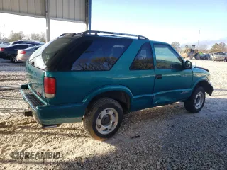 1995 GMC Jimmy SLS Base with VIN 1GKCS18WXS2519056, listed as a Copart auction lot 79313514 with 161,002 mi miles and Salvage Title. Bid and sale history available at carsss.com. Image 3.