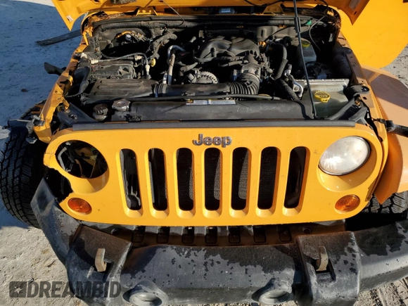 2012 Jeep Wrangler Rubicon with VIN 1C4BJWCG2CL135789, listed as a Copart auction lot 42556365 with 121,908 mi miles and Salvage title. Bid and sale history available at DreamBid. Image 11.