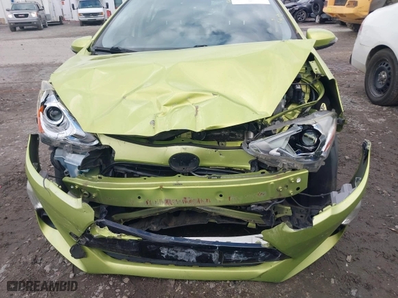 2015 Toyota Prius c One with VIN JTDKDTB36F1096872, listed as a IAAI auction lot 41202434 with 130,386 mi miles. Bid and sale history available at carsss.com. Image 6.