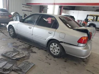 2000 Honda Civic VP with VIN 2HGEJ6614YH524394, listed as a IAAI auction lot 41709806 with 205,197 mi miles. Bid and sale history available at carsss.com. Image 3.