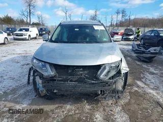 2018 Nissan Rogue S with VIN 5N1AT2MT2JC738034, listed as a IAAI auction lot 41286839 with 125,037 mi miles and . Bid and sale history available at DreamBid. Image 12.