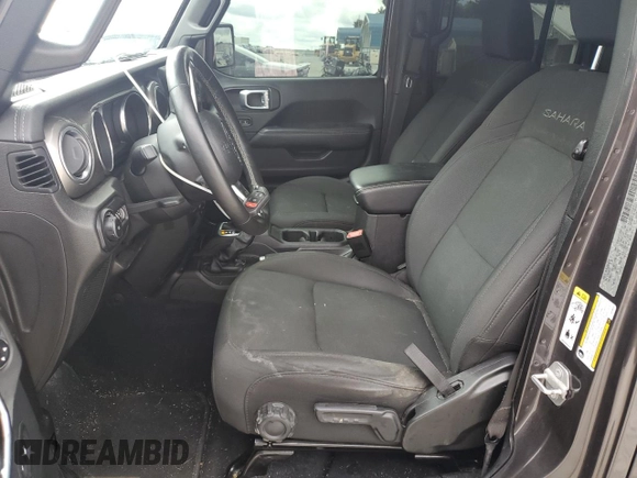 2018 Jeep Wrangler Unlimited Sahara с VIN 1C4HJXEG0JW308332, выставлен на аукционе Copart как лот 58778355 с пробегом 90 384 миль миль и Списание • Salvage title. История ставок и продаж доступна на DreamBid. Изображение 7.