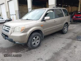 2006 Honda Pilot EX-L with VIN 2HKYF18516H528116, listed as a IAAI auction lot 41782324 with 245,280 mi miles and . Bid and sale history available at DreamBid. Image 17.