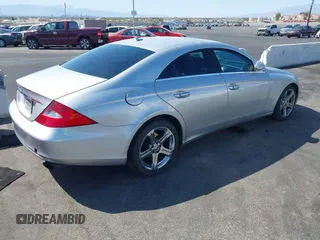 2007 Mercedes-Benz CLS-Class 5.5L with VIN WDDDJ72X17A087032, listed as a IAAI auction lot 42012898 with 174,912 mi miles. Bid and sale history available at carsss.com. Image 4.