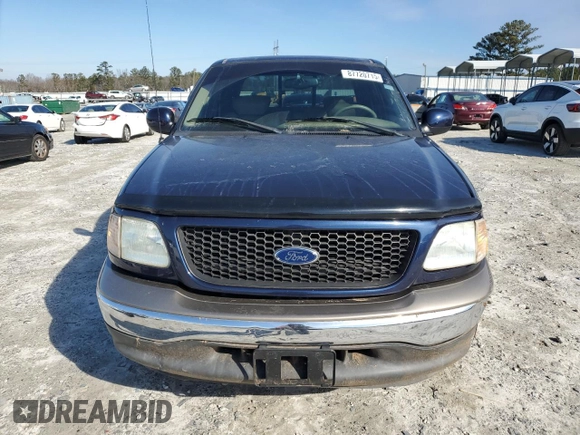 2002 Ford F-150 XLT with VIN 1FTRW07L52KA67609, listed as a Copart auction lot 87720715 with 177,615 mi miles and Salvage Title. Bid and sale history available at carsss.com. Image 5.