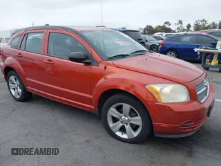 2010 Dodge Caliber SXT with VIN 1B3CB4HA9AD586821, listed as a IAAI auction lot 42182586 with 138,503 mi miles and . Bid and sale history available at DreamBid. Image 1.