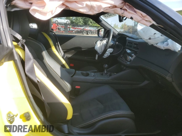 2023 Nissan Z Performance z VIN JN1BZ4BH8PM310184, wystawiony jako Copart lot #67059724 z przebiegiem 4 438 mil mil oraz Szkoda całkowita • Salvage title. Historia ofert i sprzedaży dostępna na DreamBid. Obrazek 10.