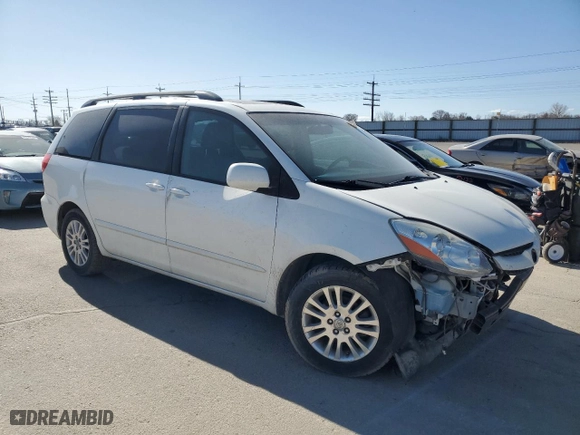 2010 Toyota Sienna XLE with VIN 5TDYK4CC8AS311023, listed as a Copart auction lot 47574285 with 209,186 mi miles and Salvage Title. Bid and sale history available at carsss.com. Image 4.