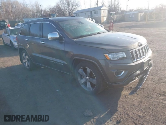 2015 Jeep Grand Cherokee Overland with VIN 1C4RJFCT3FC725239, listed as a IAAI auction lot 41779555 with 100,837 mi miles. Bid and sale history available at carsss.com. Image 1.