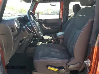 2014 Jeep Wrangler Rubicon with VIN 1C4BJWCG9EL285532, listed as a Copart auction lot 56548325 with 100,032 mi miles and Salvage title. Bid and sale history available at DreamBid. Image 7.