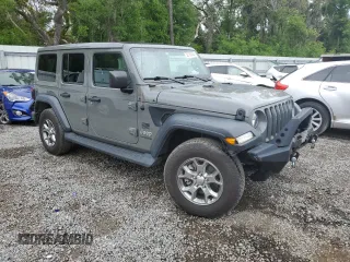 2020 Jeep Wrangler Unlimited Freedom with VIN 1C4HJXDG0LW285901, listed as a Copart auction lot 52193555 with 63,823 mi miles and Salvage title. Bid and sale history available at DreamBid. Image 4.