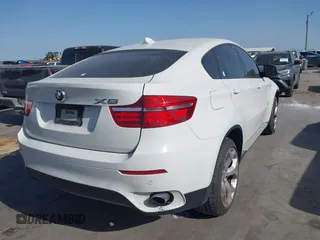 2014 BMW X6 xDrive35i z VIN 5UXFG2C5XE0C44062, wystawiony jako IAAI lot #41848304 z przebiegiem 154 683 mil mil oraz . Historia ofert i sprzedaży dostępna na DreamBid. Obrazek 4.