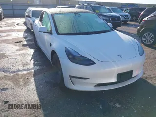 2023 Tesla Model 3 Long Range with VIN 5YJ3E1EB6PF633550, listed as a IAAI auction lot 41861278 with 45,743 mi miles and . Bid and sale history available at DreamBid. Image 1.