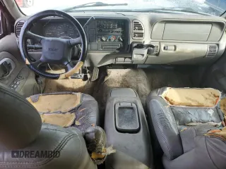1999 GMC Yukon with VIN 1GKEC13R7XJ802387, listed as a Copart auction lot 82819934 with 438,574 mi miles and Salvage Title. Bid and sale history available at carsss.com. Image 8.