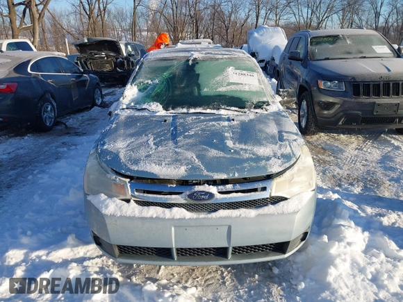 2009 Ford Focus SE z VIN 1FAHP35N79W262568, wystawiony jako IAAI lot #41288346 z przebiegiem 138 902 mil mil oraz . Historia ofert i sprzedaży dostępna na DreamBid. Obrazek 12.