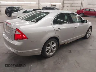 2012 Ford Fusion SE with VIN 3FAHP0HAXCR339239, listed as a IAAI auction lot 42622696 with 168,153 mi miles and . Bid and sale history available at DreamBid. Image 4.