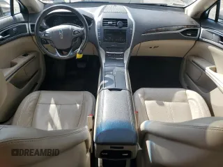 2016 Lincoln MKZ z VIN 3LN6L2GK6GR615811, wystawiony jako Copart lot #48397495 z przebiegiem 98 926 mil mil oraz Szkoda całkowita • Salvage title. Historia ofert i sprzedaży dostępna na DreamBid. Obrazek 8.