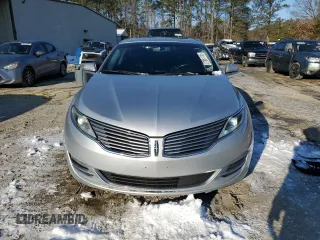 2016 Lincoln MKZ with VIN 3LN6L2JK8GR616239, listed as a Copart auction lot 87861415 with 99,199 mi miles and Salvage title. Bid and sale history available at DreamBid. Image 5.
