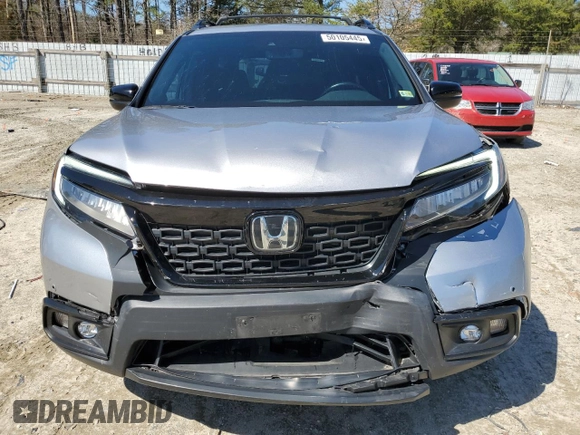 2021 Honda Passport Touring with VIN 5FNYF8H95MB014129, listed as a Copart auction lot 50105445 with 108,872 mi miles and Salvage Title. Bid and sale history available at carsss.com. Image 5.