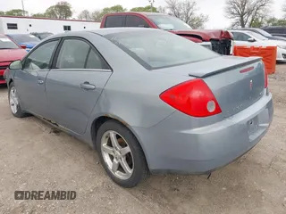 2009 Pontiac G6 GT 1SA with VIN 1G2ZH57NX94107761, listed as a IAAI auction lot 42138285 with 150,805 mi miles and . Bid and sale history available at DreamBid. Image 3.