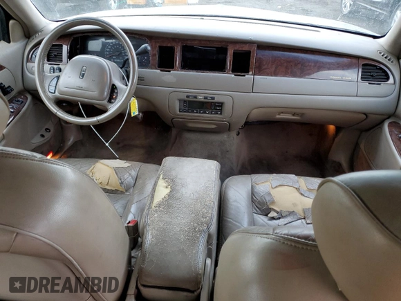 2001 Lincoln Town Car Executive z VIN 1LNHM81W81Y700002, wystawiony jako Copart lot #47018365 z przebiegiem 129 456 mil mil oraz Szkoda całkowita • Salvage title. Historia ofert i sprzedaży dostępna na DreamBid. Obrazek 8.