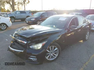 2015 Infiniti Q50 Premium z VIN JN1BV7AP5FM346323, wystawiony jako IAAI lot #41305093 z przebiegiem 112 556 mil mil oraz . Historia ofert i sprzedaży dostępna na DreamBid. Obrazek 17.