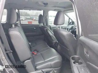2021 Honda Pilot Touring 8-Passenger with VIN 5FNYF5H9XMB014190, listed as a IAAI auction lot 41749586 with 67,602 mi miles and . Bid and sale history available at DreamBid. Image 8.