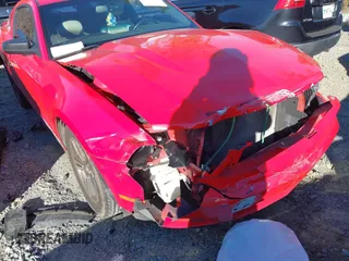 2012 Ford Mustang Premium with VIN 1ZVBP8AM0C5233157, listed as a IAAI auction lot 41580689 with 132,243 mi miles and . Bid and sale history available at DreamBid. Image 6.