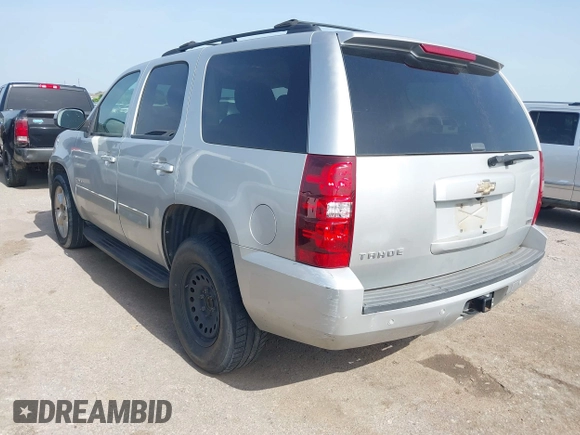 2011 Chevrolet Tahoe LS with VIN 1GNSCAE0XBR111949, listed as a IAAI auction lot 42630787 with 220,857 mi miles and . Bid and sale history available at DreamBid. Image 3.
