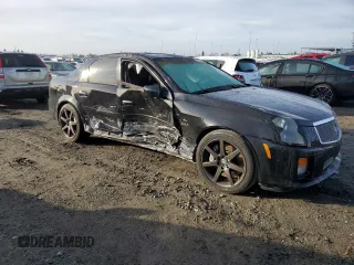2005 Cadillac CTS-V with VIN 1G6DN56S150132820, listed as a Copart auction lot 87428484 with 128,731 mi miles and Salvage Title. Bid and sale history available at carsss.com. Image 4.