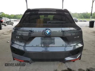 2022 BMW iX xDrive50 z VIN WB523CF02NCJ71343, wystawiony jako Copart lot #53404674 z przebiegiem 14 917 mil mil oraz Szkoda całkowita • Salvage title. Historia ofert i sprzedaży dostępna na DreamBid. Obrazek 6.
