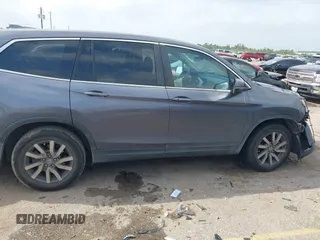 2020 Honda Pilot EX-L z VIN 5FNYF5H55LB028509, wystawiony jako IAAI lot #41945843 z przebiegiem Nie podano mil oraz . Historia ofert i sprzedaży dostępna na DreamBid. Obrazek 13.