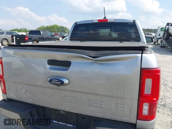 2023 Ford Ranger XL with VIN 1FTER4FH2PLE03244, listed as a IAAI auction lot 42101665 with 78,152 mi miles and . Bid and sale history available at DreamBid. Image 6.