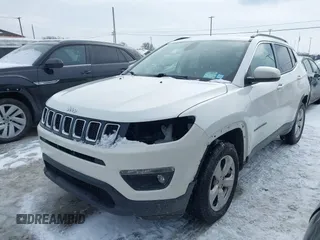 2019 Jeep Compass Latitude with VIN 3C4NJDBB0KT813014, listed as a IAAI auction lot 41560221 with 63,307 mi miles. Bid and sale history available at carsss.com. Image 2.