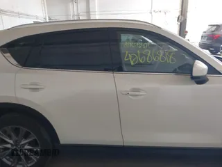 2019 Mazda CX-5 Grand Touring with VIN JM3KFBDM5K0520852, listed as a IAAI auction lot 42686818 with 36,800 mi miles and . Bid and sale history available at DreamBid. Image 13.