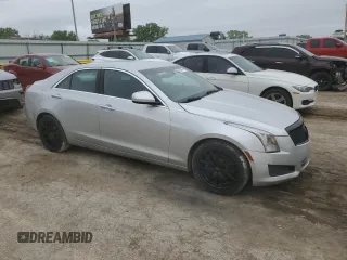 2013 Cadillac ATS z VIN 1G6AA5RAXD0140219, wystawiony jako Copart lot #53788495 z przebiegiem 149 556 mil mil oraz Szkody całkowita. Historia ofert i sprzedaży dostępna na DreamBid. Obrazek 4.