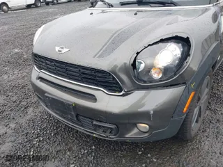 2014 MINI Cooper Countryman S with VIN WMWZC5C56EWP40320, listed as a IAAI auction lot 41792374 with 103,894 mi miles. Bid and sale history available at carsss.com. Image 6.