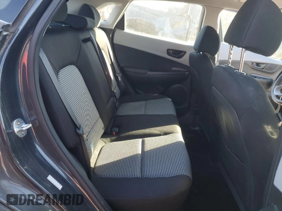2018 Hyundai Kona SE с VIN KM8K12AAXJU081149, выставлен на аукционе Copart как лот 89287375 с пробегом 57 611 миль миль и Списание • Salvage title. История ставок и продаж доступна на DreamBid. Изображение 11.
