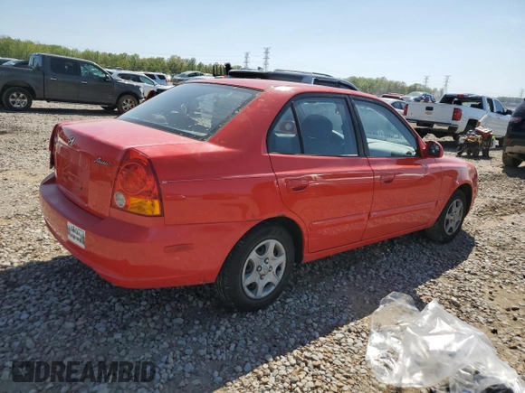 2005 Hyundai Accent GLS with VIN KMHCG45C15U592443, listed as a Copart auction lot 52291025 with 142,263 mi miles and Salvage Title. Bid and sale history available at carsss.com. Image 3.
