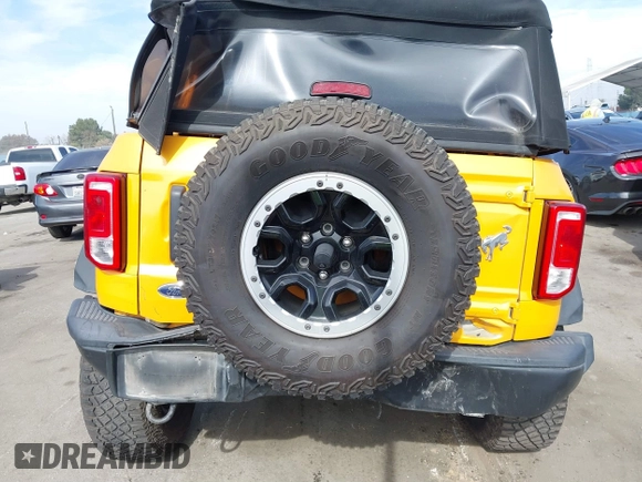 2022 Ford Bronco with VIN 1FMEE5DH6NLB14350, listed as a IAAI auction lot 41486823 with 27,587 mi miles and . Bid and sale history available at DreamBid. Image 16.