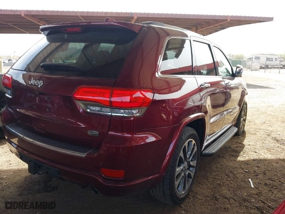 2018 Jeep Grand Cherokee Overland with VIN 1C4RJFCG1JC173042, listed as a IAAI auction lot 41705160 with 64,949 mi miles. Bid and sale history available at carsss.com. Image 4.