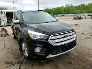 2018 Ford Escape SE z VIN 1FMCU9GD4JUA95666, wystawiony jako Copart lot #55767485 z przebiegiem 60 743 mil mil oraz Nie do naprawy • Non repairable. Historia ofert i sprzedaży dostępna na DreamBid. Obrazek 14.