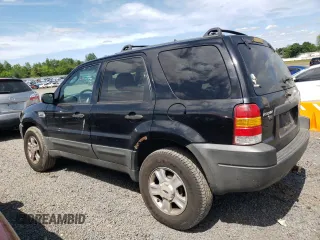 2003 Ford Escape XLT Popular 2 with VIN 1FMYU93133KB35168, listed as a Copart auction lot 57303335 with 197,368 mi miles and Salvage title. Bid and sale history available at DreamBid. Image 2.