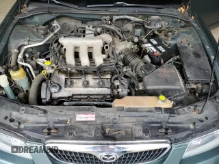 2000 Mazda Millenia z VIN JM1TA2212Y1610919, wystawiony jako Copart lot #80375014 z przebiegiem 127 938 mil mil oraz Szkody całkowita. Historia ofert i sprzedaży dostępna na DreamBid. Obrazek 13.