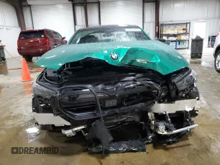 2025 BMW M5 z VIN WBS83FK04SCT95434, wystawiony jako Copart lot #56969865 z przebiegiem Nie podano mil oraz Szkody całkowita. Historia ofert i sprzedaży dostępna na DreamBid. Obrazek 5.