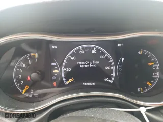 2015 Jeep Grand Cherokee Altitude with VIN 1C4RJFAG0FC209734, listed as a Copart auction lot 52973105 with 130,955 mi miles and Salvage Title. Bid and sale history available at carsss.com. Image 9.