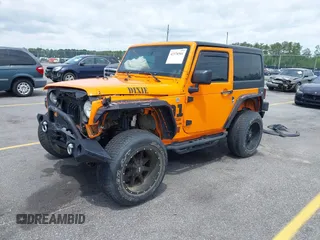 2013 Jeep Wrangler Sport z VIN 1C4AJWAG2DL538526, wystawiony jako IAAI lot #42378501 z przebiegiem 81 709 mil mil oraz . Historia ofert i sprzedaży dostępna na DreamBid. Obrazek 23.