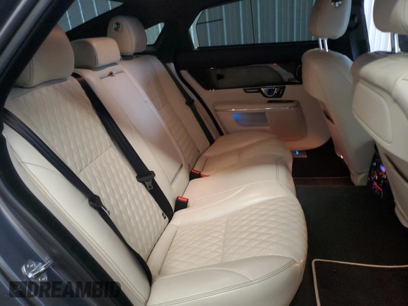 2019 Jaguar XJ Portfolio with VIN SAJWA2G71K8W19797, listed as a Copart auction lot 54133195 with 57,446 mi miles and Salvage Title. Bid and sale history available at DreamBid. Image 10.